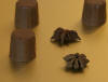 Honing Anijs Bonbon. Heerlijke romige chocolade die je niet kan laten liggen. Steranijs, honing, room, boter, melkchocolade, 36% cacao.